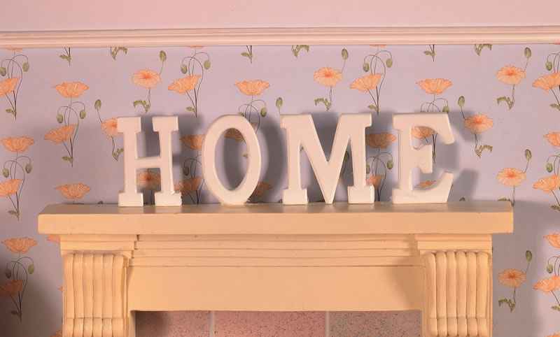 Letters HOME in hout