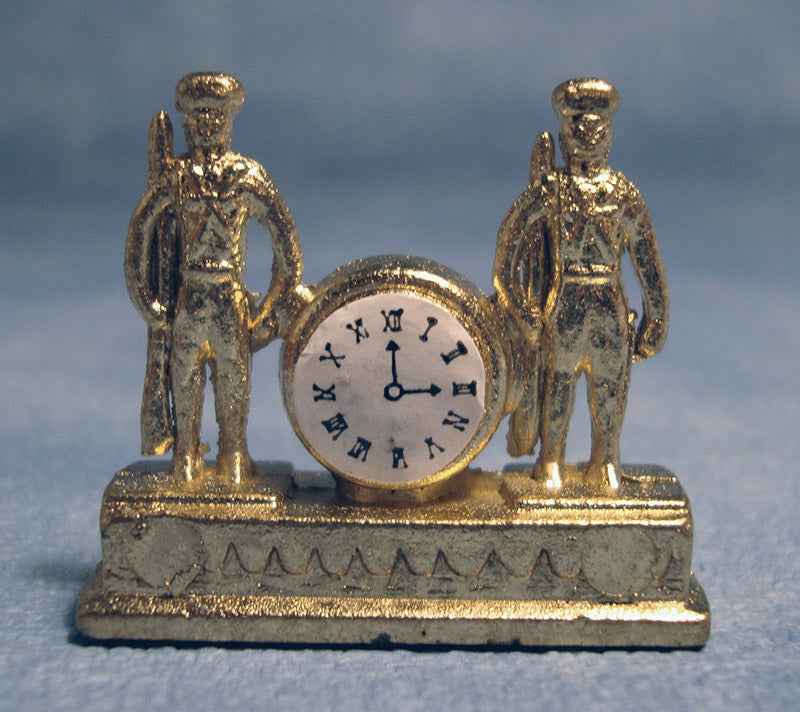 Gouden klok met soldaten