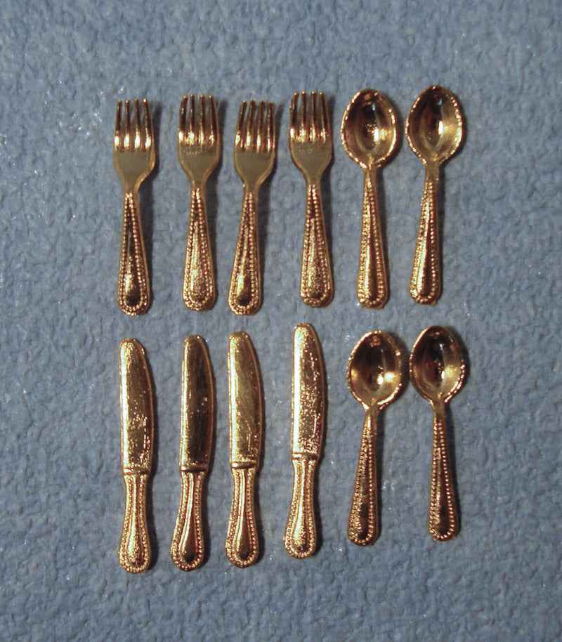Gouden bestek set