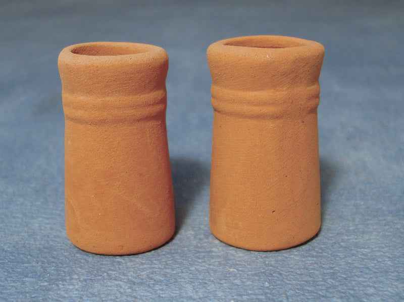 Kleine ronde schoorstenen, 2 stuks