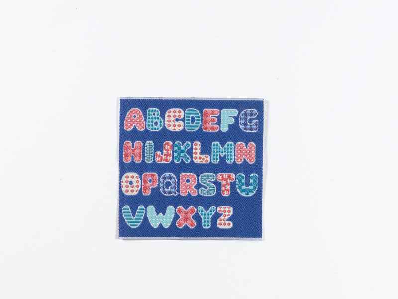 Blauw alfabet kleed
