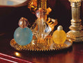 Blad met parfumflesjes, 4 stuks