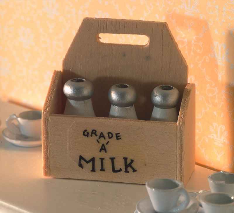 Houten krat met melk