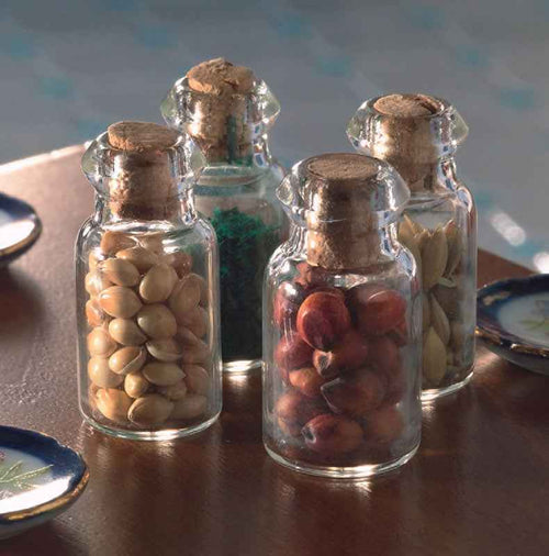 4 gevulde glazen potten