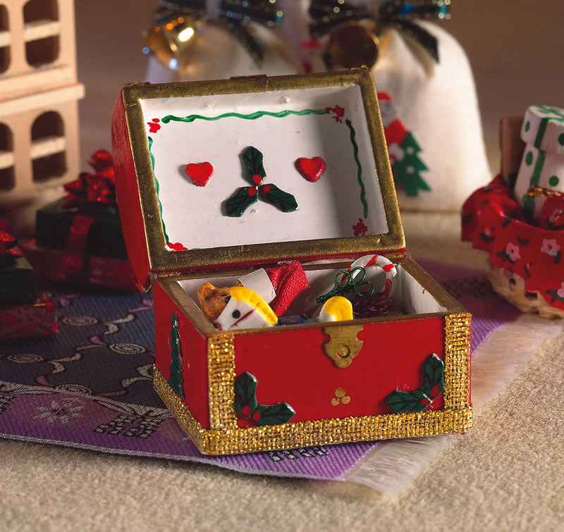 kist met kerstspullen