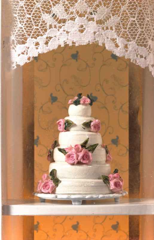 Bruidstaart met roze bloemen