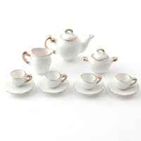 wit met goud thee servies