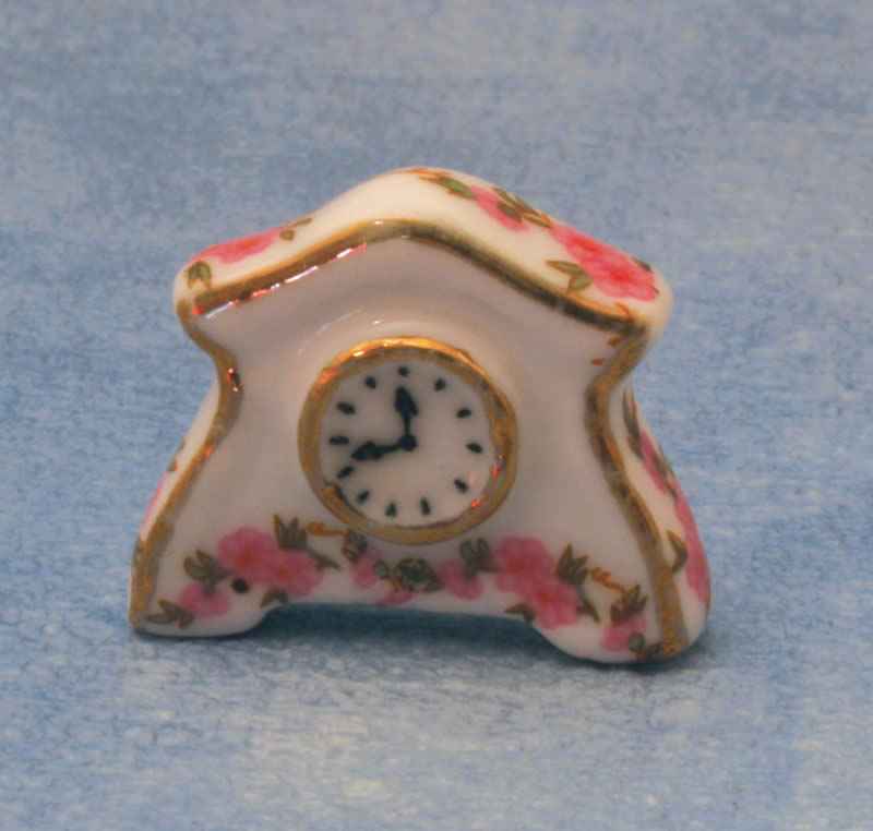 Keramische roze klok