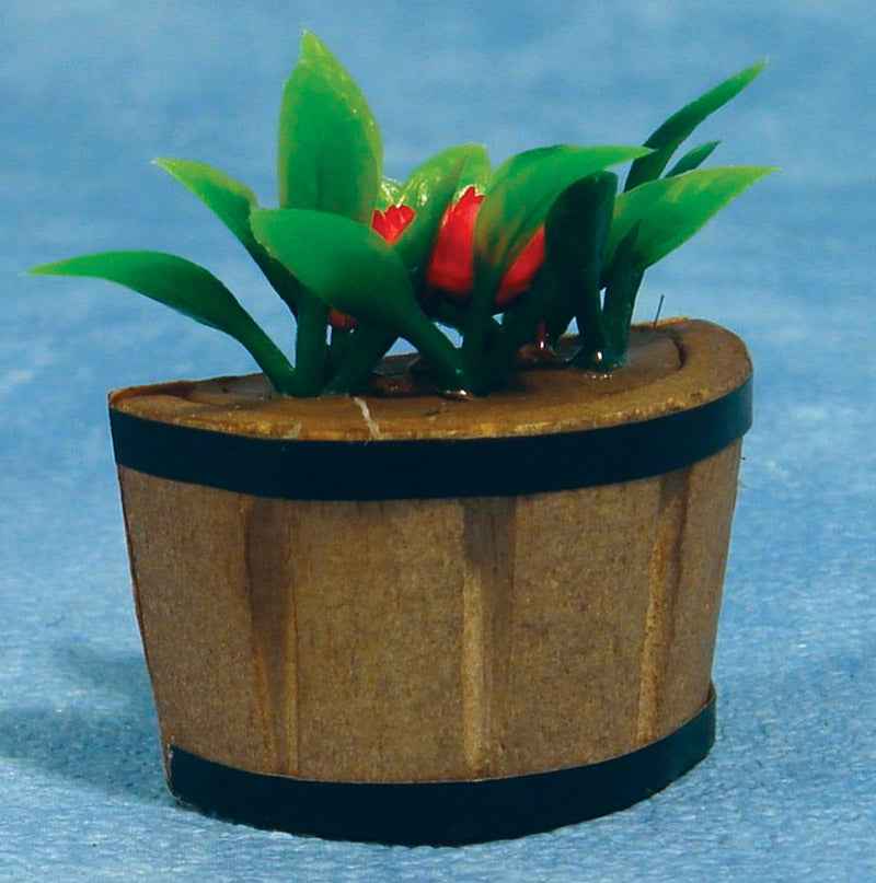 Halve plantenbak met bloemen