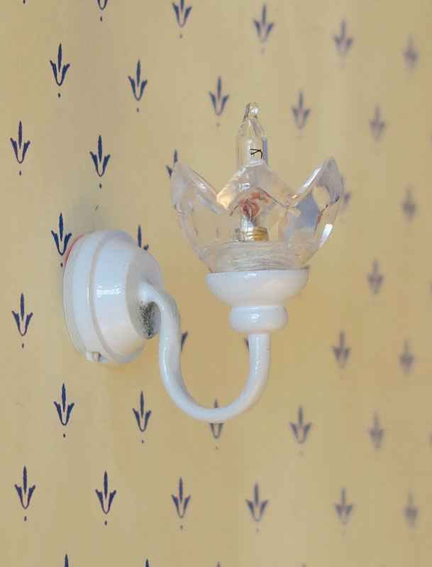 Witte wandverlichting met helder glas