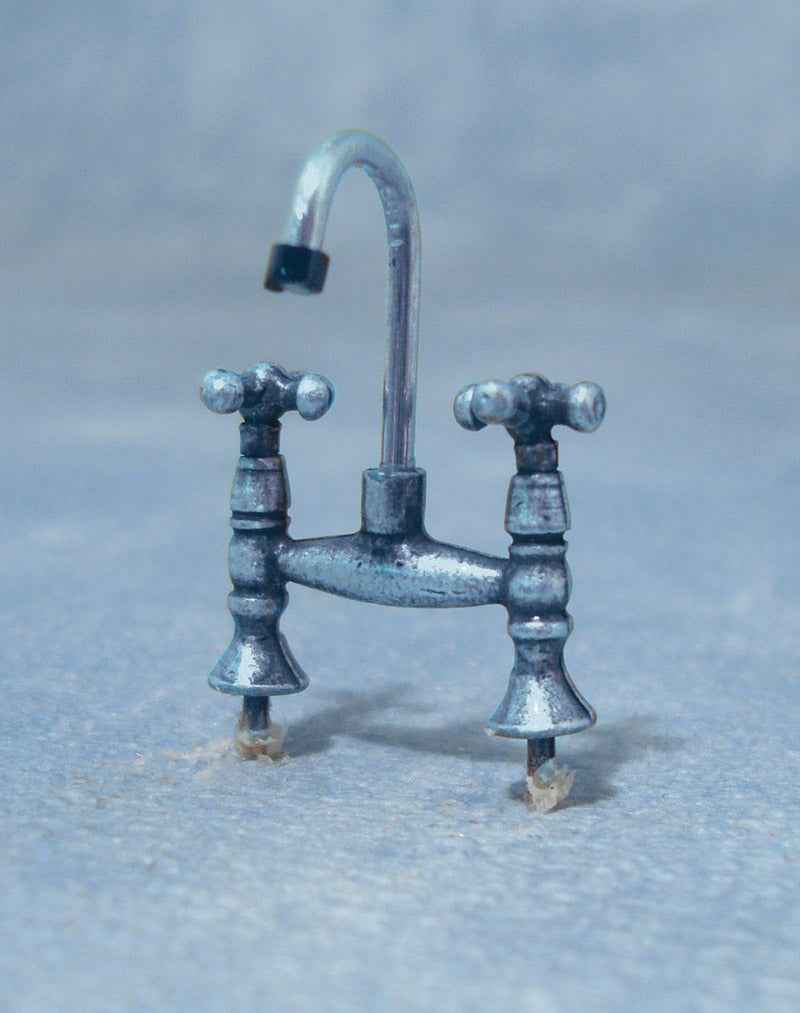 zilver oudewetsmodel kraan