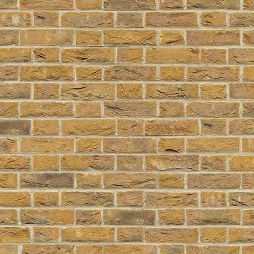 Gele bakstenen met relief