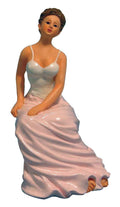vrouw in Corset zittend
