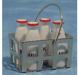 Vier flessen melk in krat