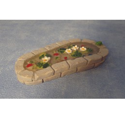 Tuinvijver met waterlelies, uitgevoerd in steen